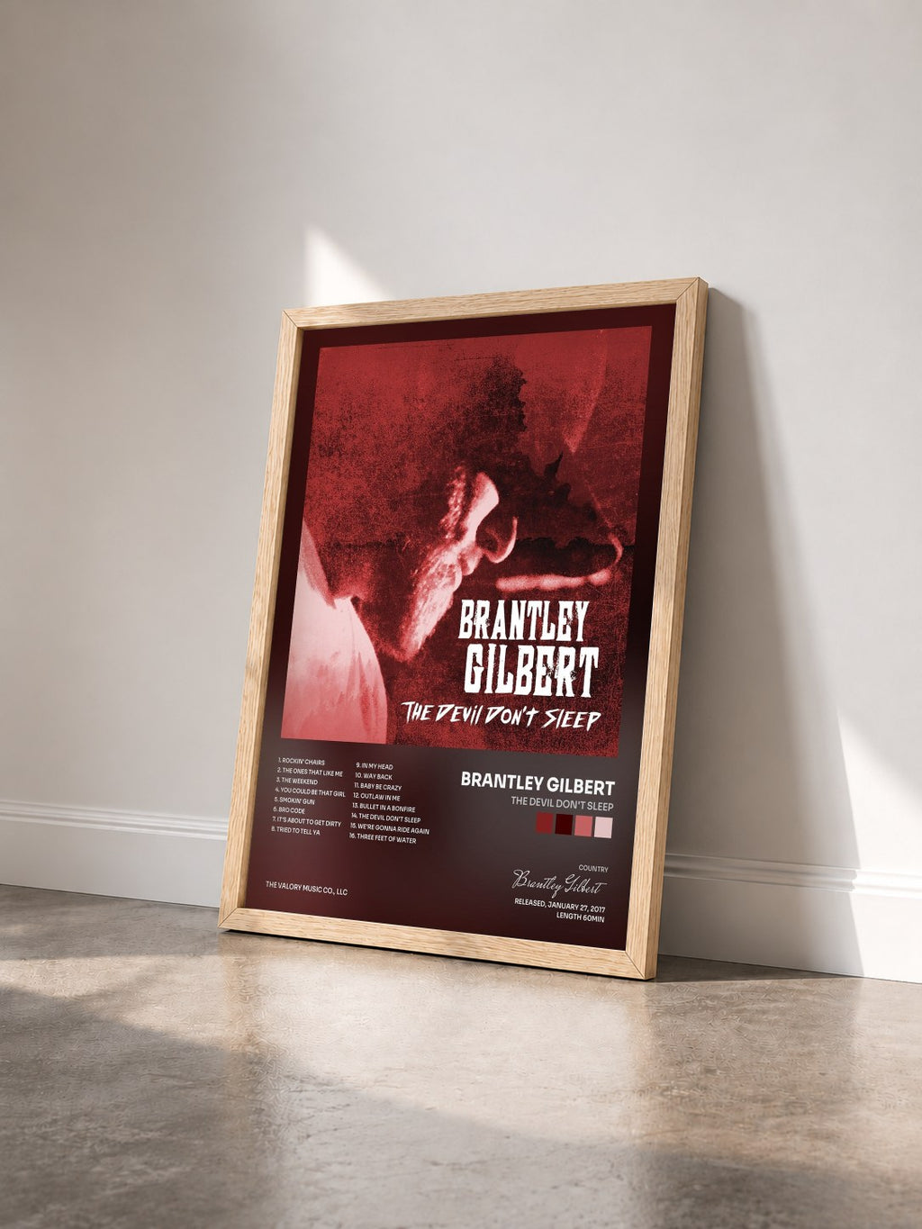 #bois Tableau de l'album The Devil Don't Sleep de Brantley Gilbert vu de trois quarts, cadre en bois brut