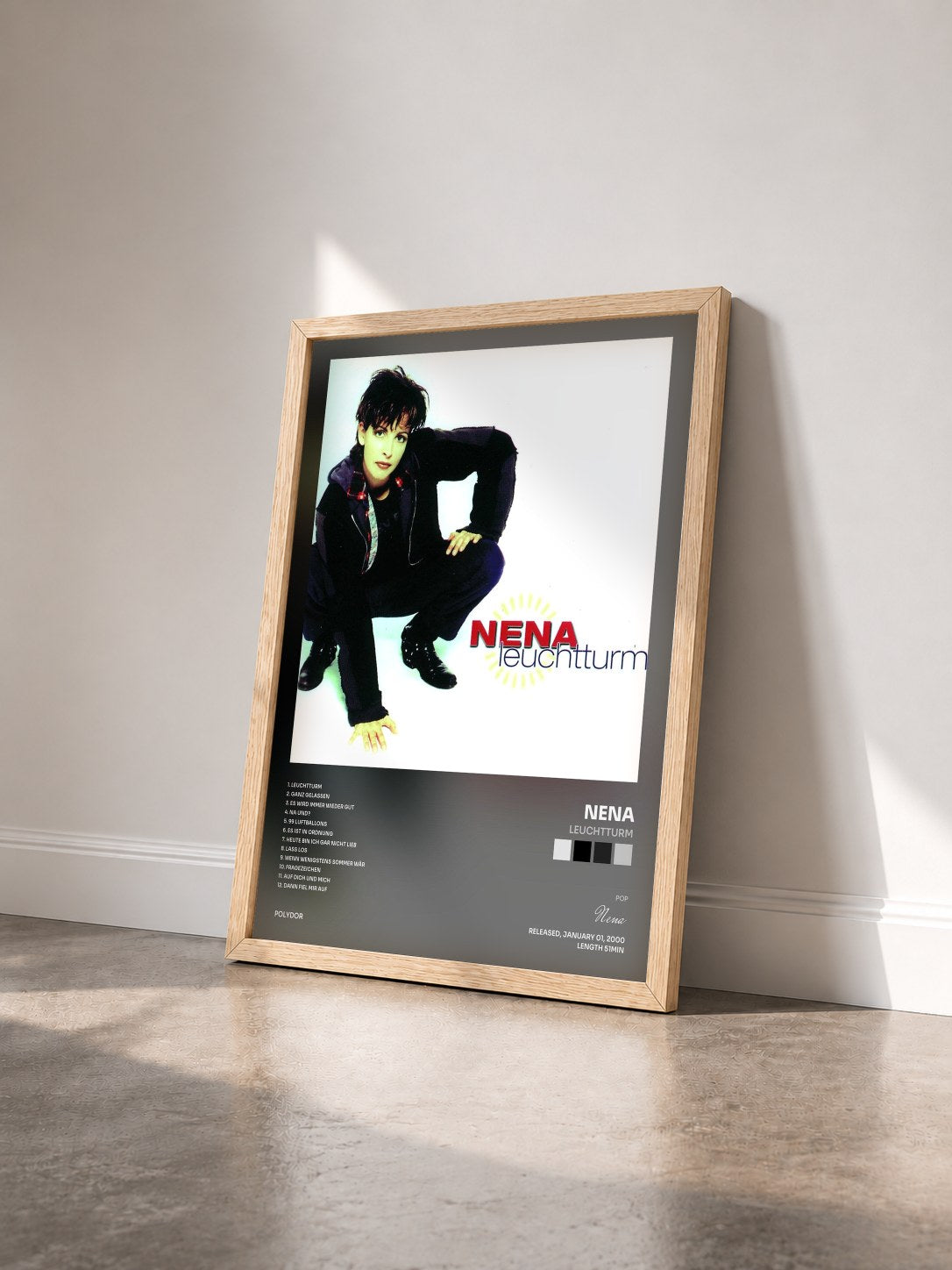 #bois Tableau de l'album Leuchtturm de Nena vu de trois quarts, cadre en bois brut