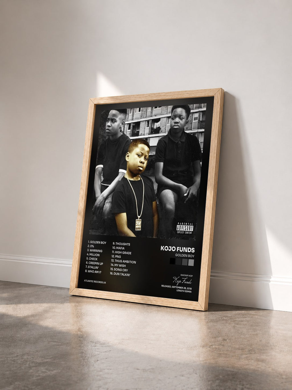 #bois Tableau de l'album Golden Boy de Kojo Funds vu de trois quarts, cadre en bois brut