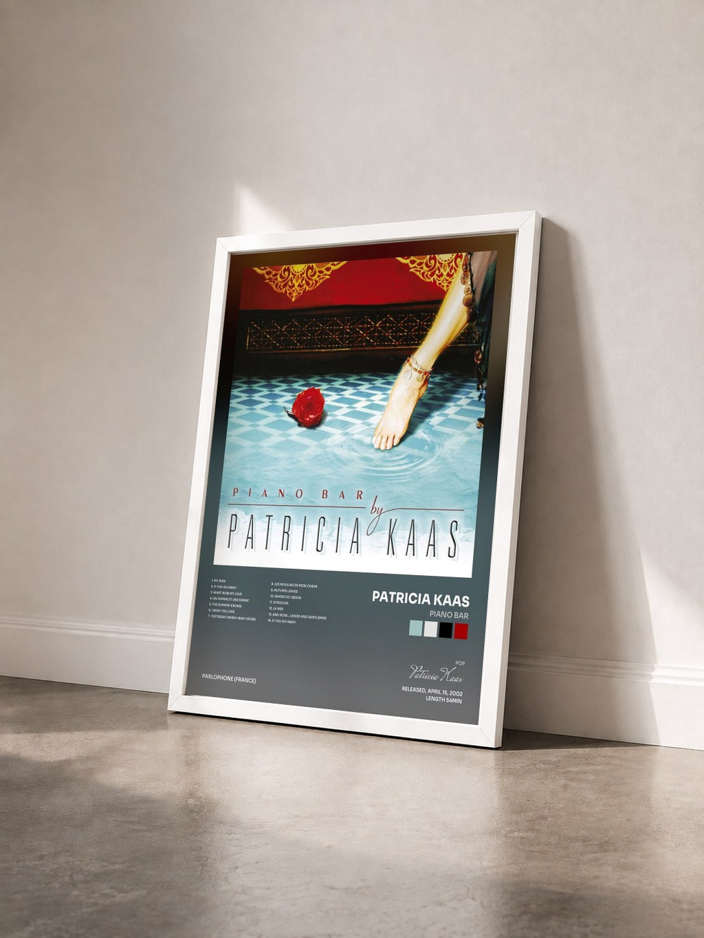 #blanc Tableau de l'album Piano Bar de Patricia Kaas vu de trois quarts, cadre blanc