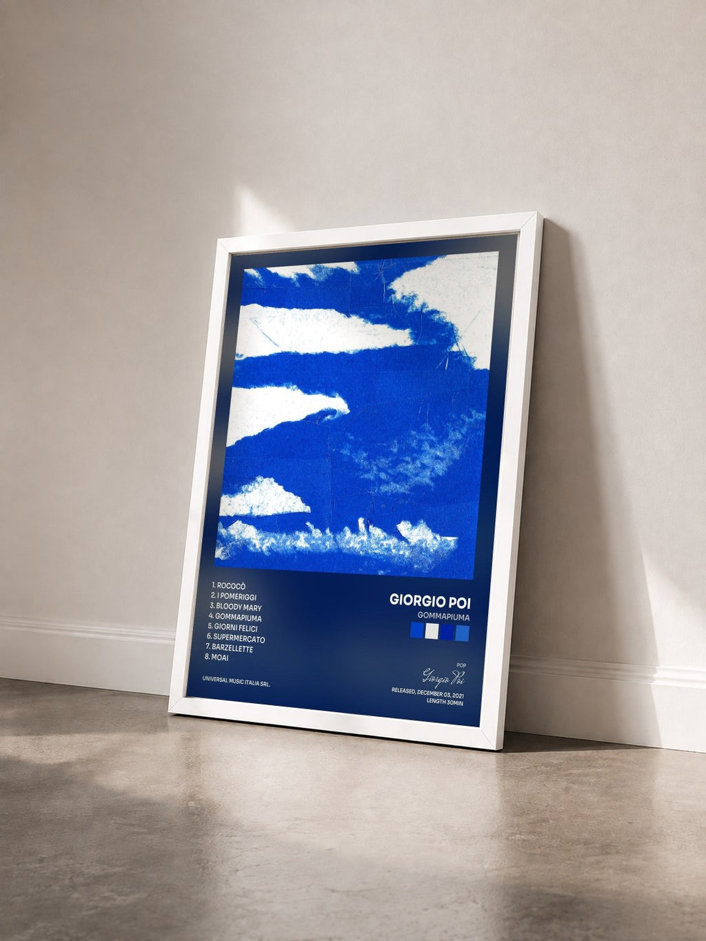 #blanc Tableau de l'album Gommapiuma de Giorgio Poi vu de trois quarts, cadre blanc