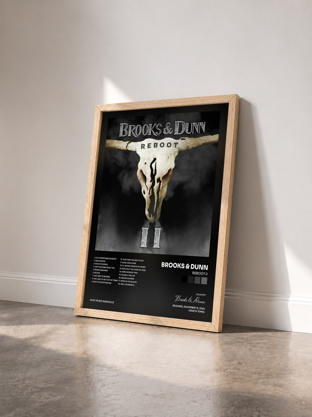 #bois Tableau de l'album Reboot II de Brooks & Dunn vu de trois quarts, cadre en bois brut
