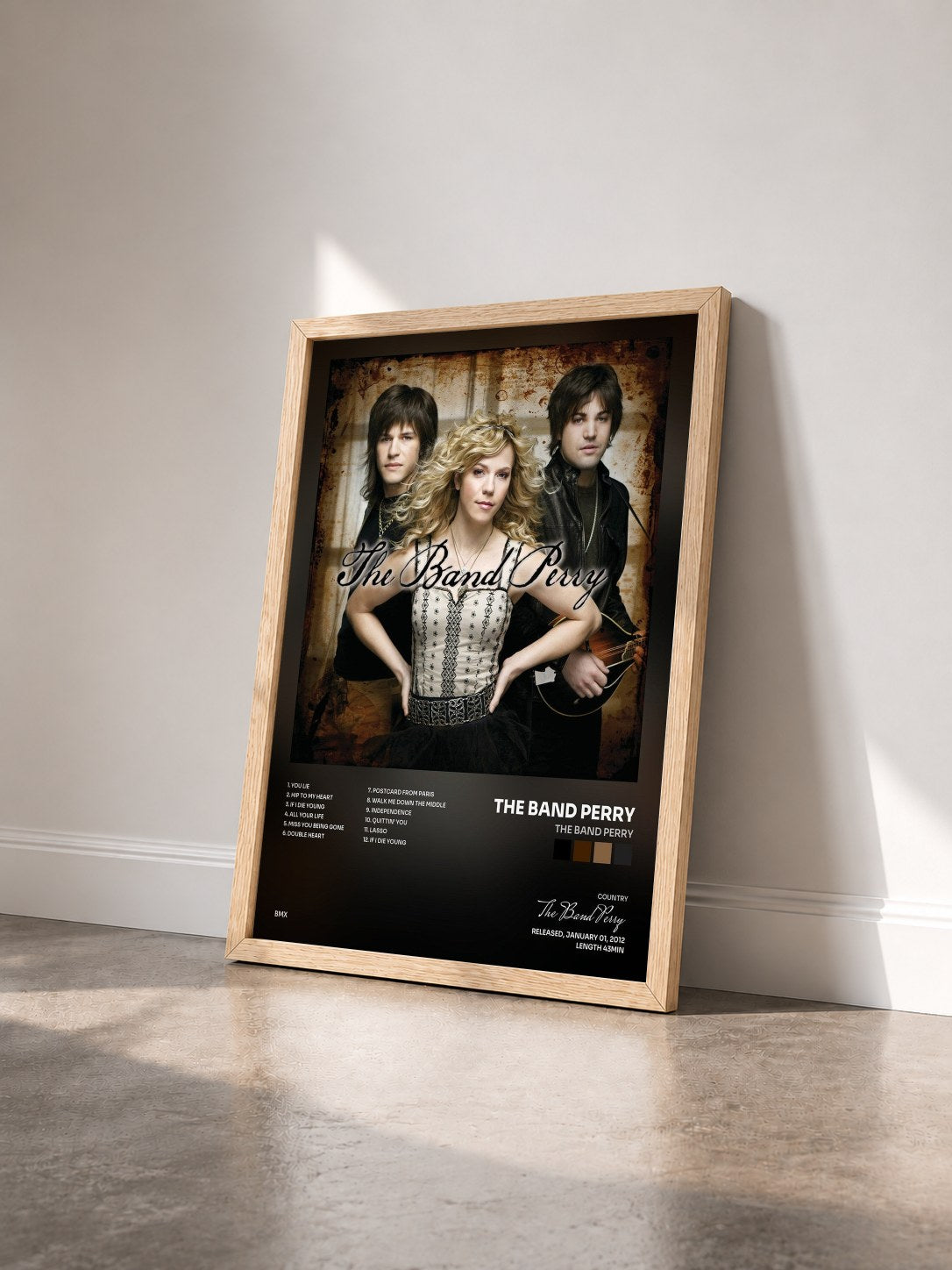 #bois Tableau de l'album The Band Perry de The Band Perry vu de trois quarts, cadre en bois brut