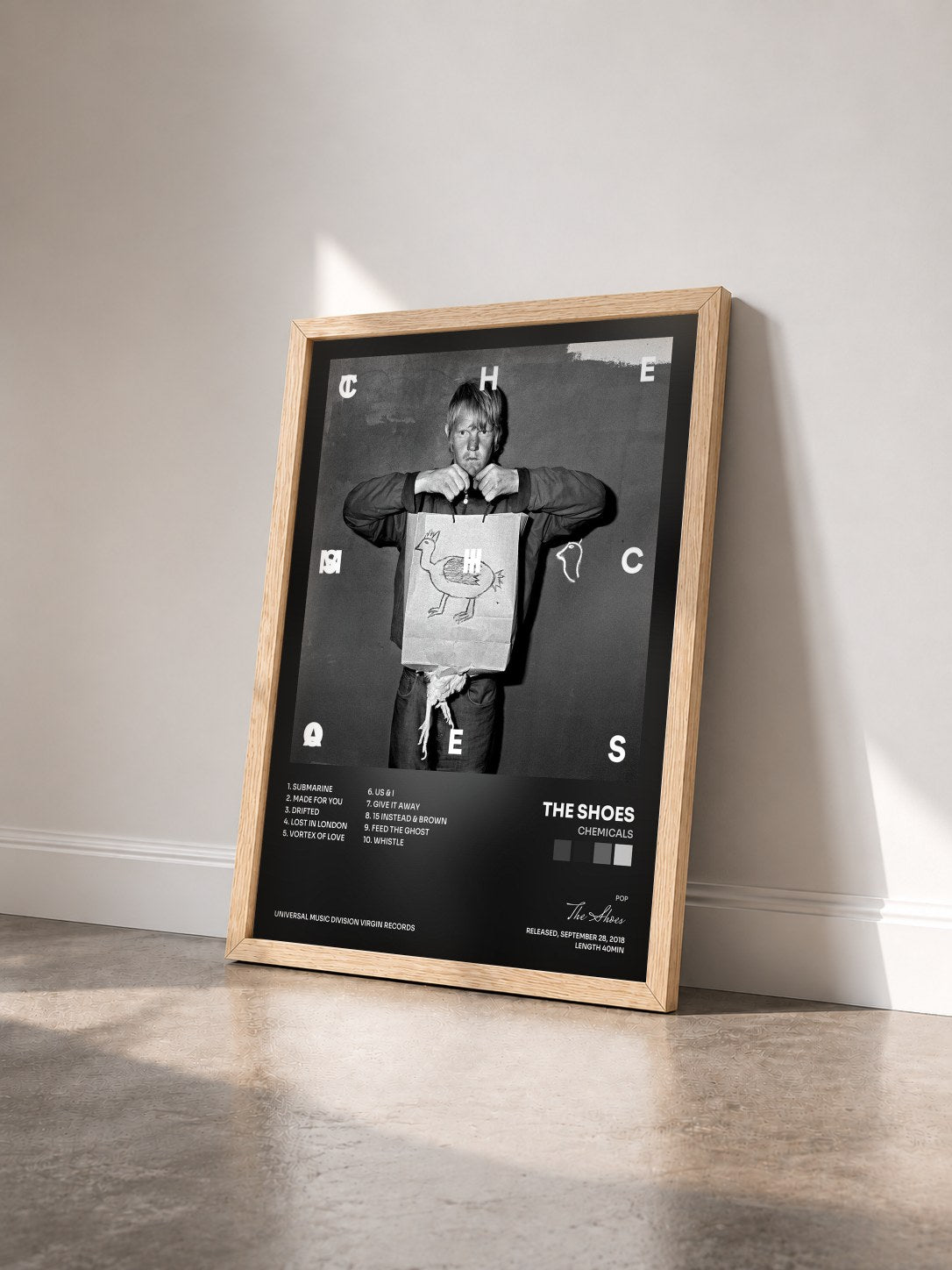 #bois Tableau de l'album Chemicals de The Shoes vu de trois quarts, cadre en bois brut