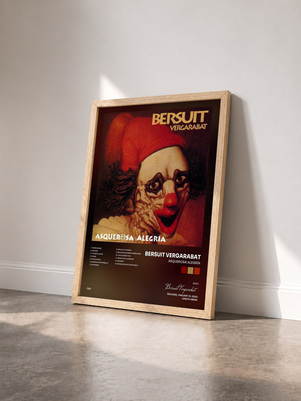 #bois Tableau de l'album Asquerosa Alegría de Bersuit Vergarabat vu de trois quarts, cadre en bois brut