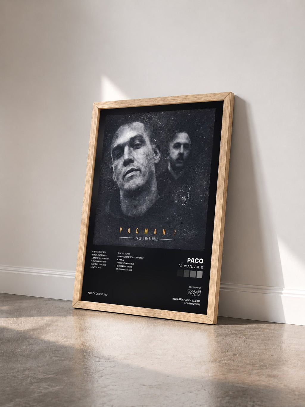 #bois Tableau de l'album Pacman, Vol. 2 de PACO vu de trois quarts, cadre en bois brut