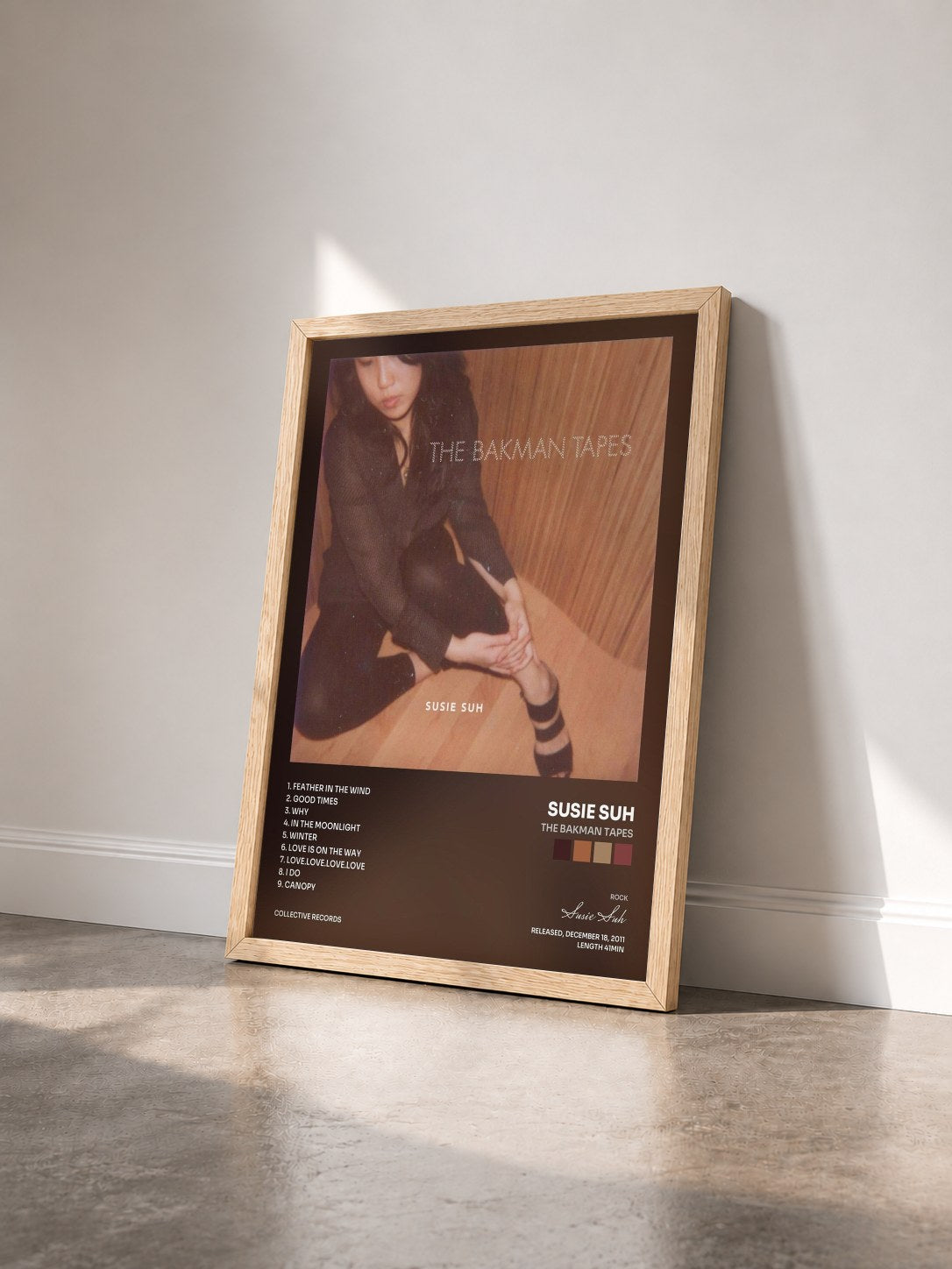 #bois Tableau de l'album The Bakman Tapes de Susie Suh vu de trois quarts, cadre en bois brut