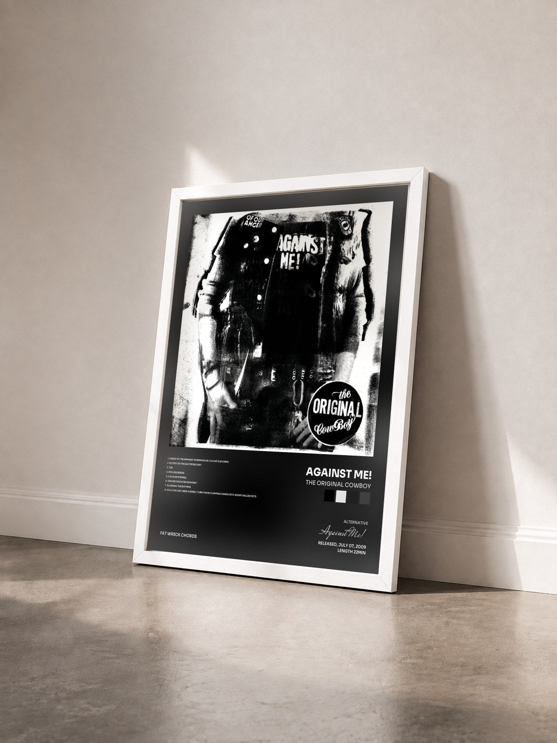 #blanc Tableau de l'album The Original Cowboy de Against Me! vu de trois quarts, cadre blanc