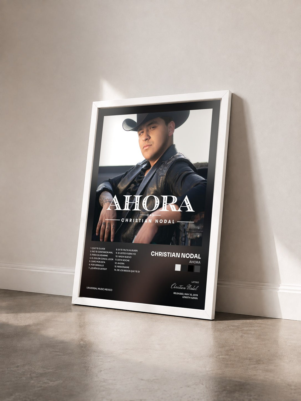 #blanc Ahora by Christian Nodal as a framed art print seen at an angle, white frame