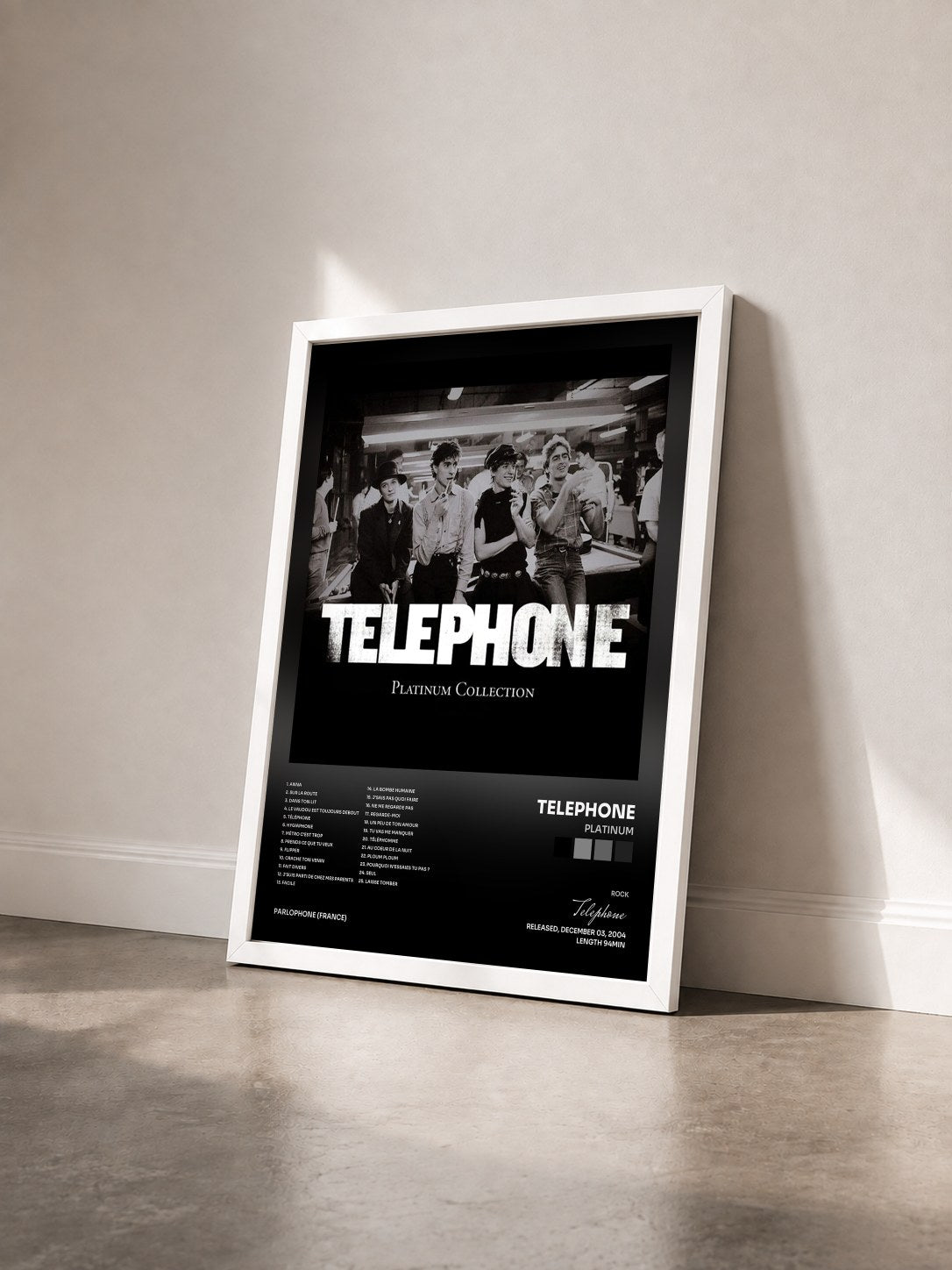 #blanc Tableau de l'album Platinum de Telephone vu de trois quarts, cadre blanc