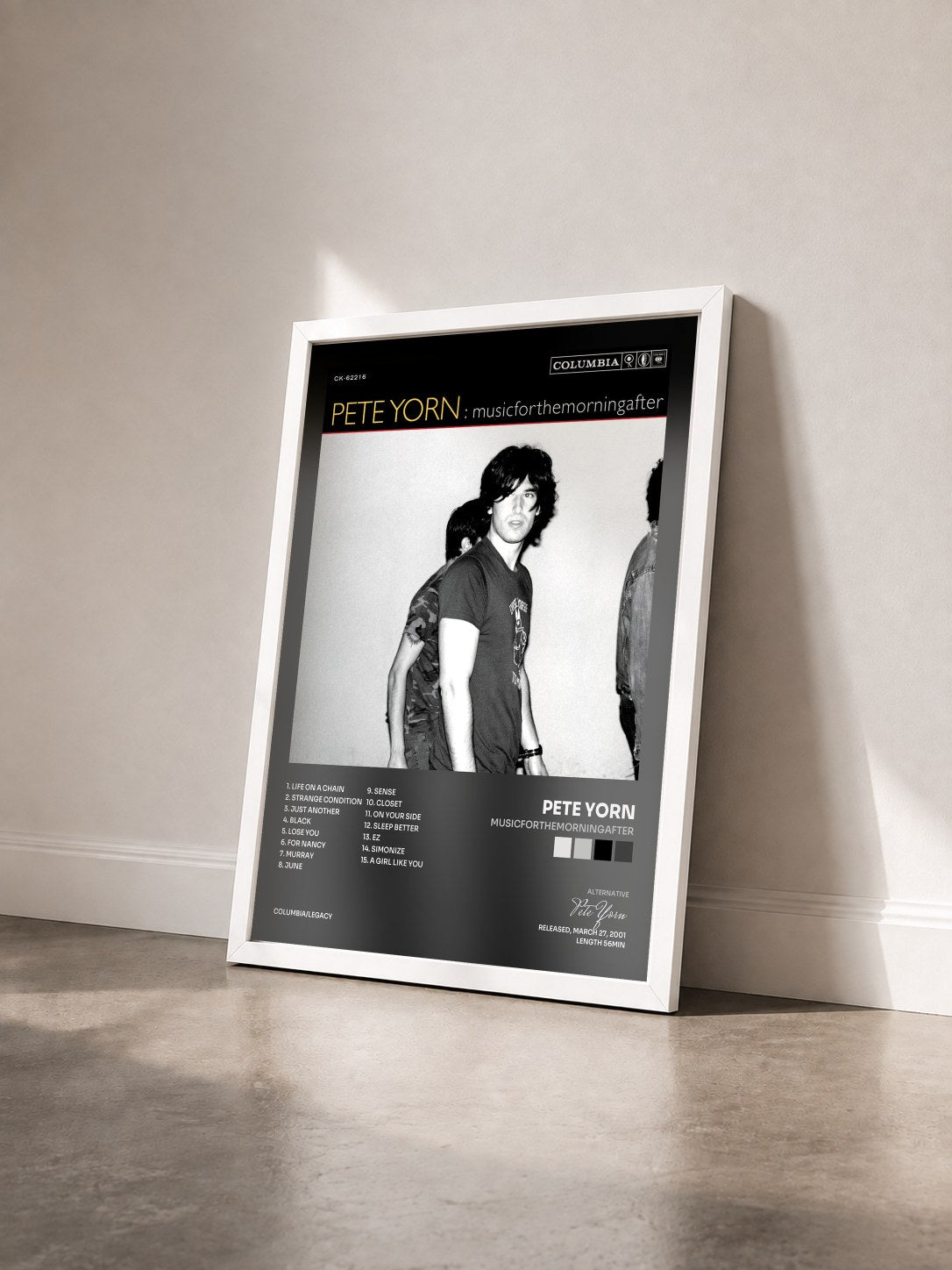 #blanc Tableau de l'album musicforthemorningafter de Pete Yorn vu de trois quarts, cadre blanc