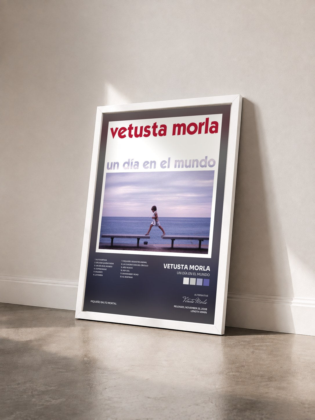 #blanc Tableau de l'album Un Día en el Mundo de Vetusta Morla vu de trois quarts, cadre blanc