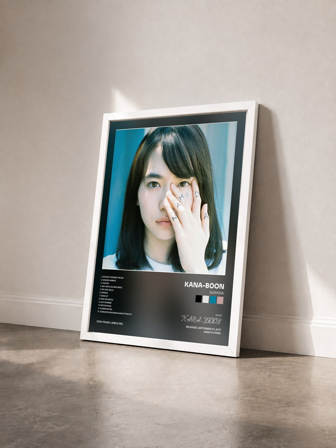 #blanc Tableau de l'album NAMiDA de KANA-BOON vu de trois quarts, cadre blanc