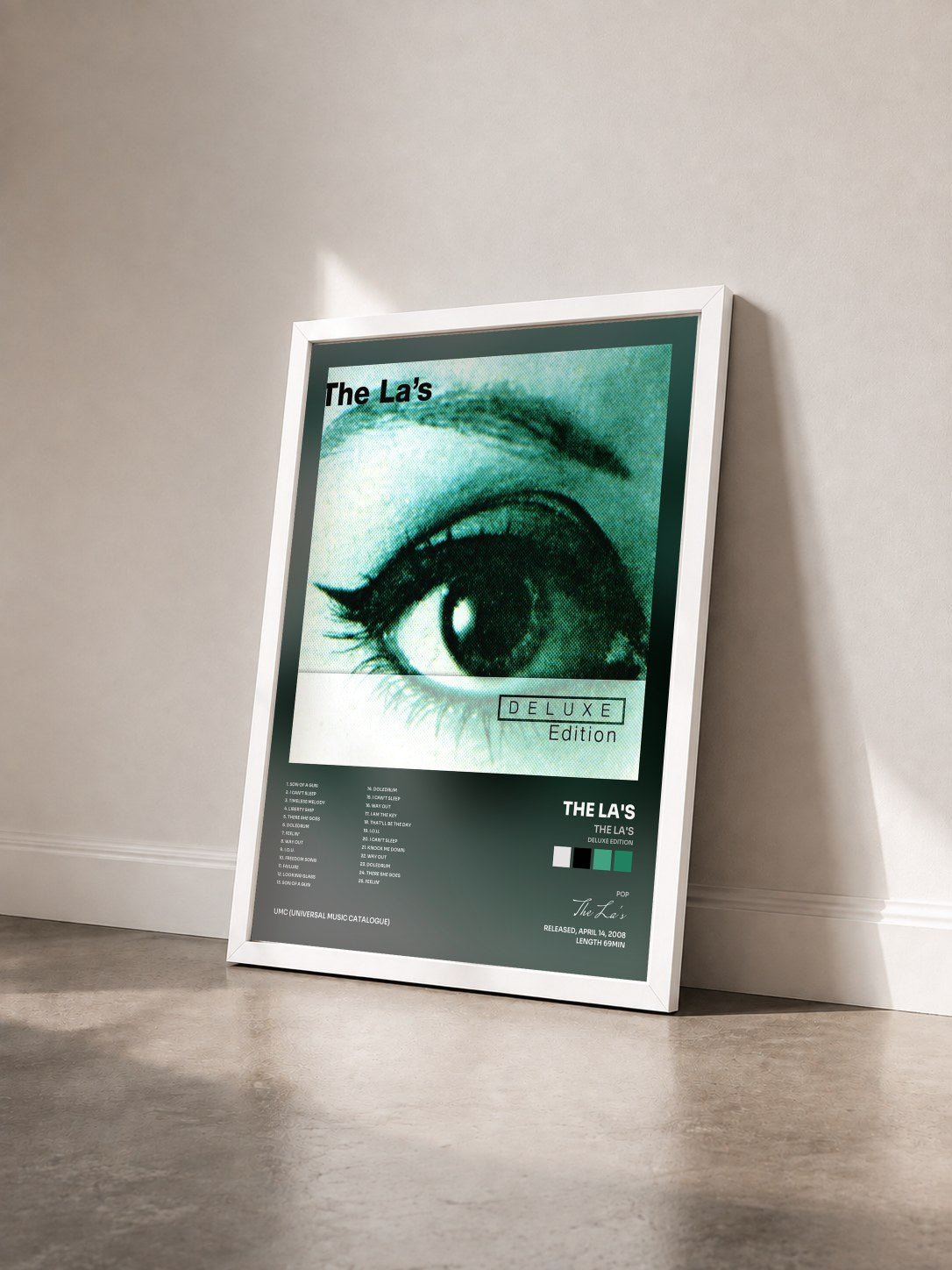 #blanc Tableau de l'album The La's (Deluxe Edition) de The La's vu de trois quarts, cadre blanc