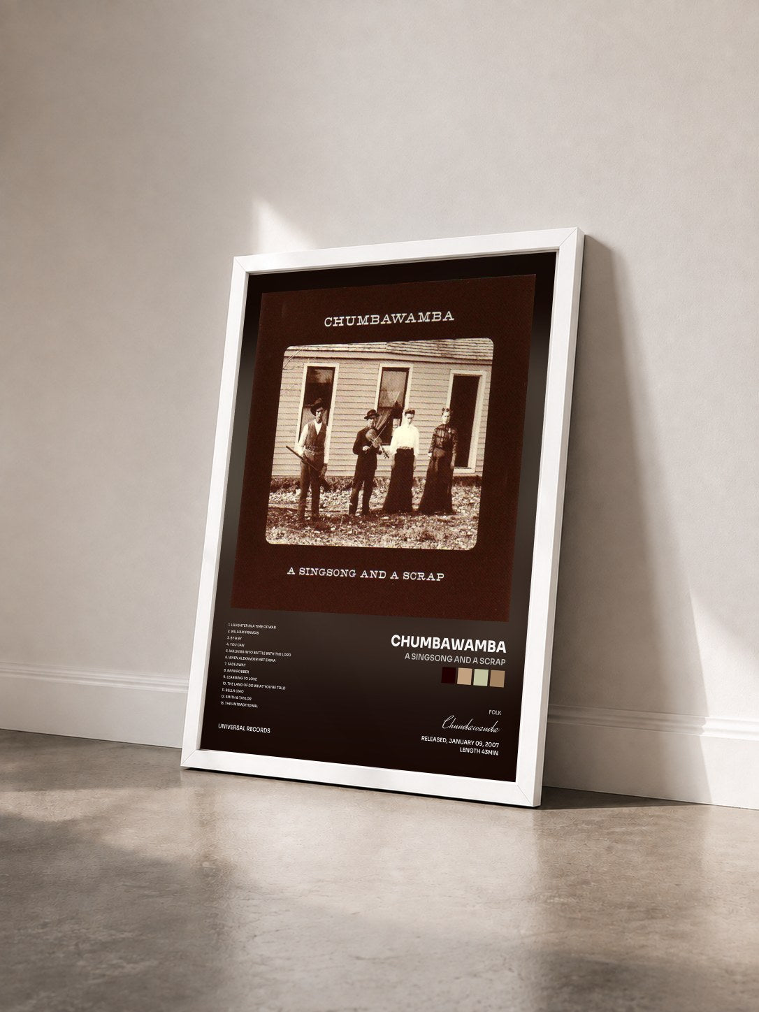 #blanc Tableau de l'album A Singsong And A Scrap de Chumbawamba vu de trois quarts, cadre blanc