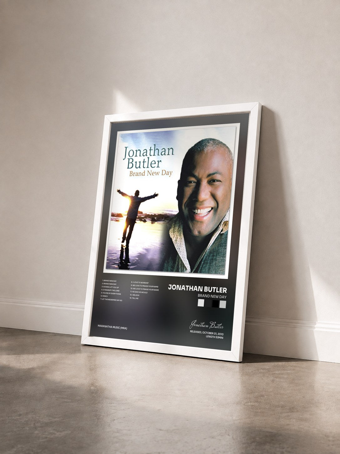 #blanc Tableau de l'album Brand New Day de Jonathan Butler vu de trois quarts, cadre blanc