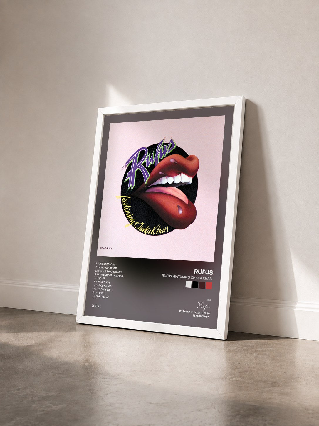 #blanc Tableau de l'album Rufus Featuring Chaka Khan de Rufus vu de trois quarts, cadre blanc