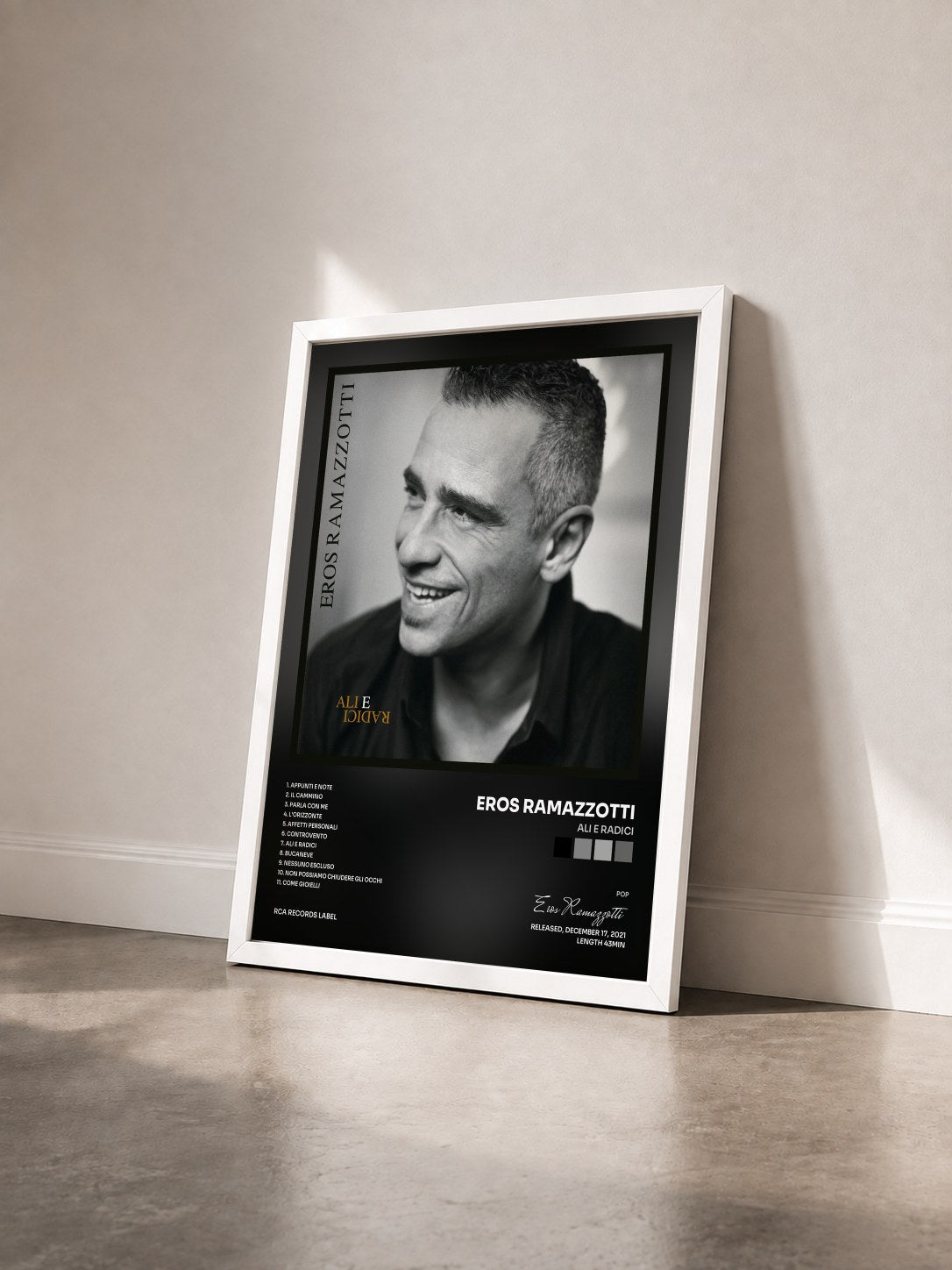 #blanc Tableau de l'album Ali E Radici de Eros Ramazzotti vu de trois quarts, cadre blanc