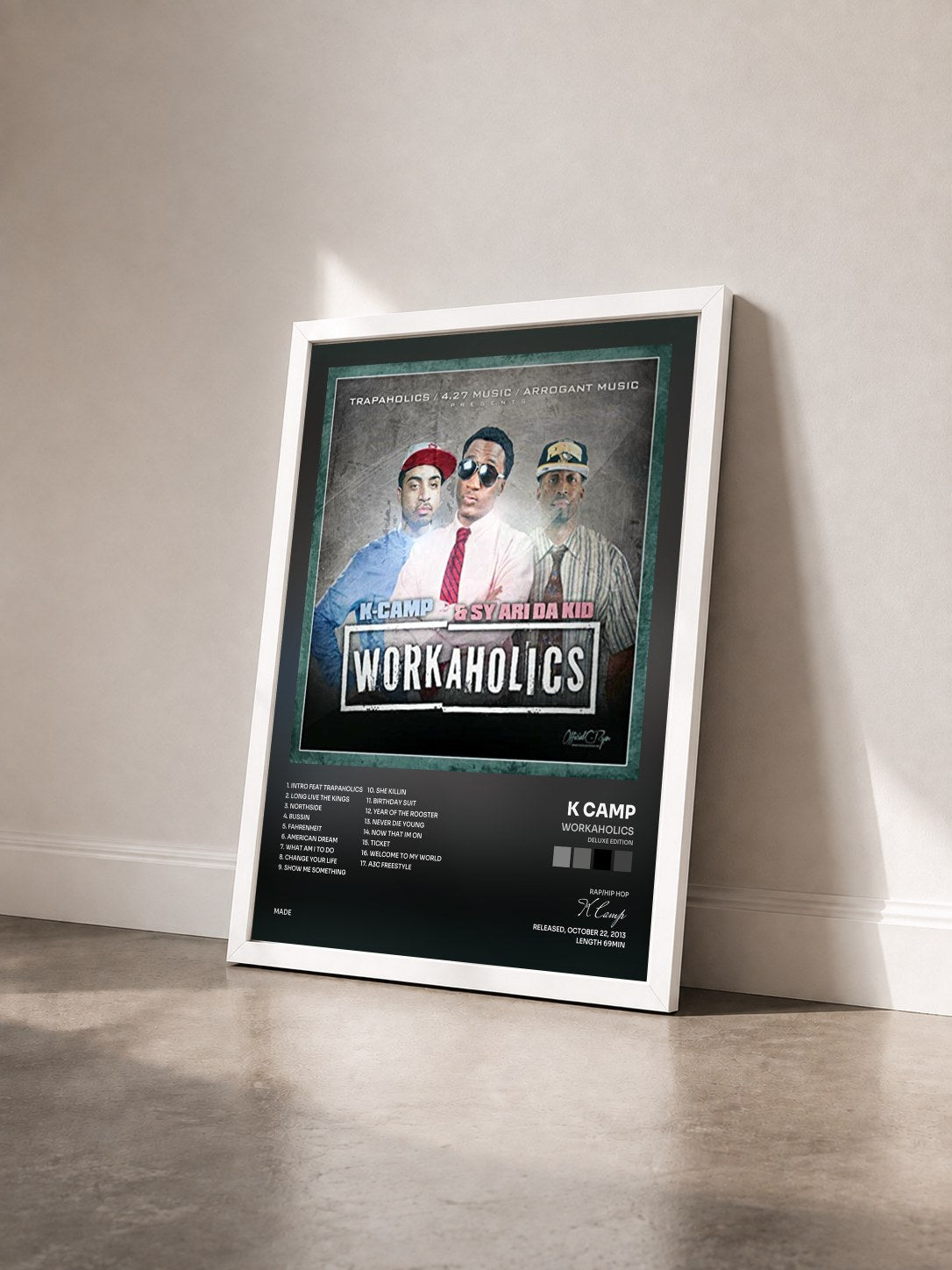 #blanc Tableau de l'album Workaholics (Deluxe Edition) de K Camp vu de trois quarts, cadre blanc