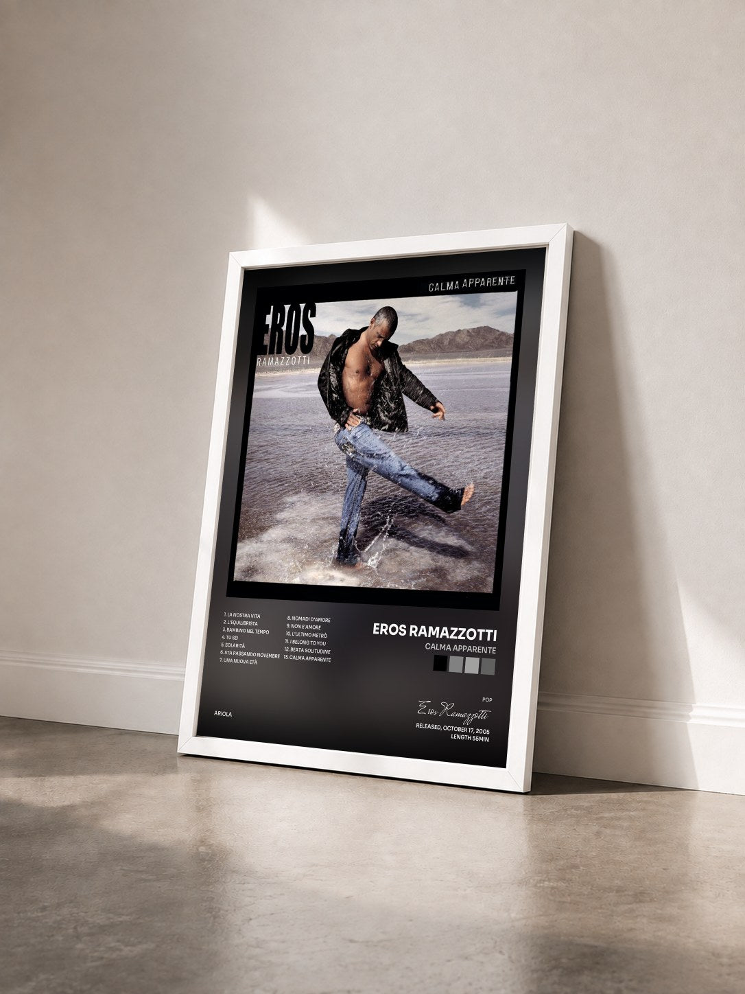 #blanc Tableau de l'album Calma Apparente de Eros Ramazzotti vu de trois quarts, cadre blanc