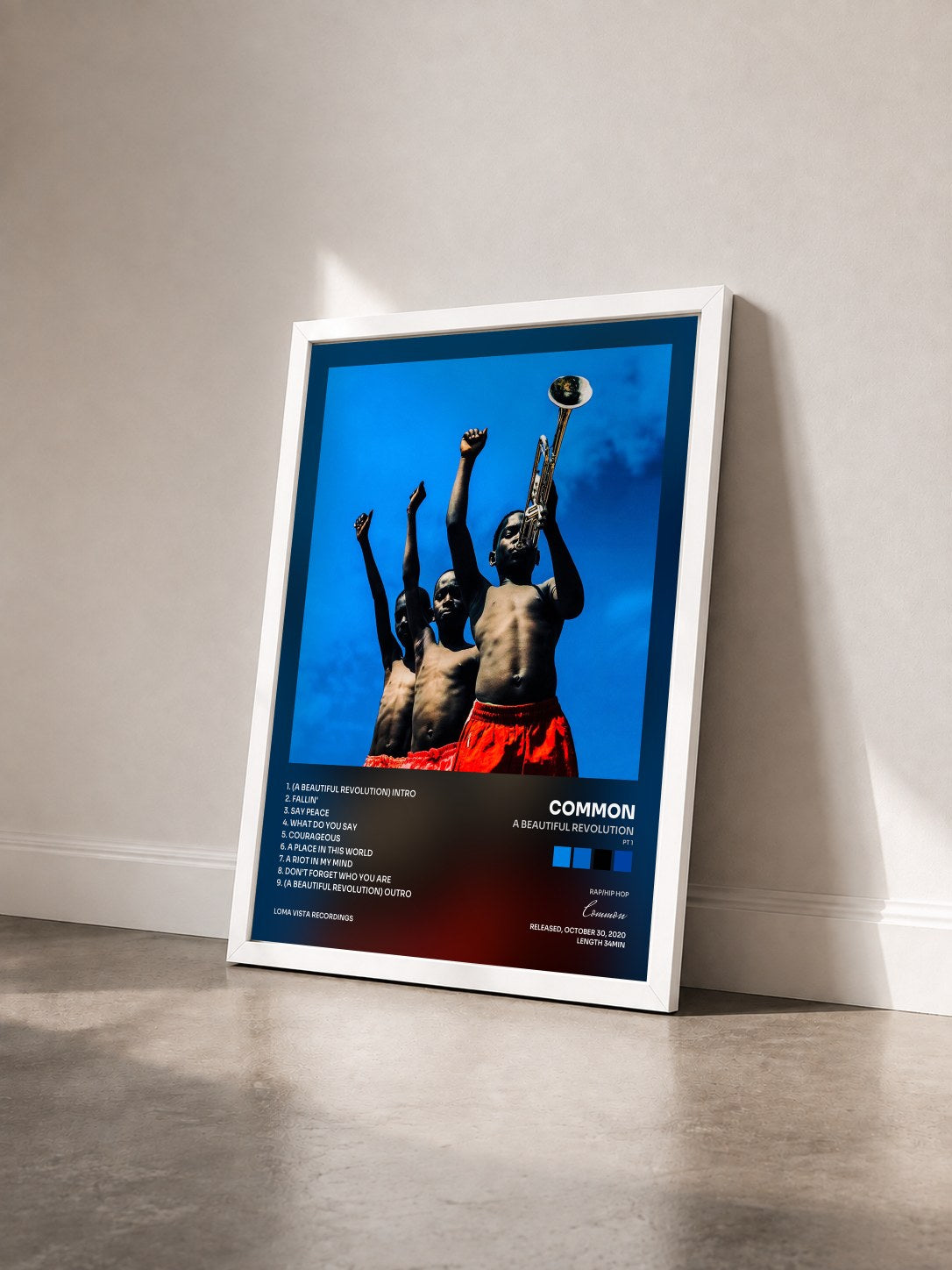 #blanc Tableau de l'album A Beautiful Revolution (Pt 1) de Common vu de trois quarts, cadre blanc