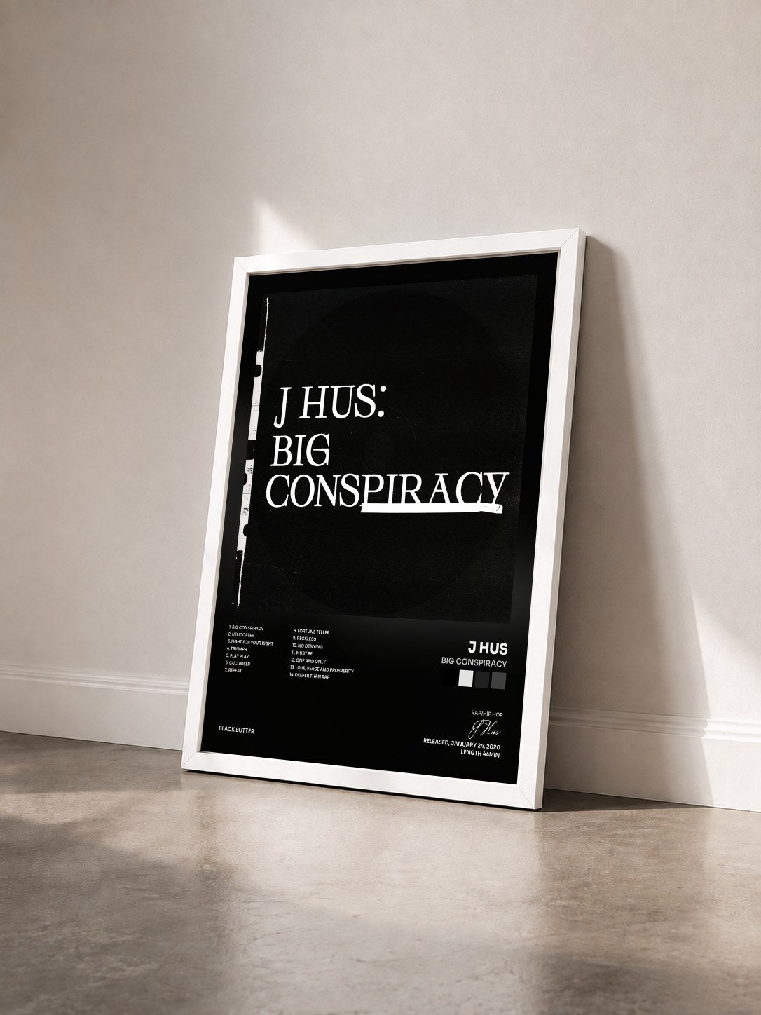 #blanc Tableau de l'album Big Conspiracy de J Hus vu de trois quarts, cadre blanc