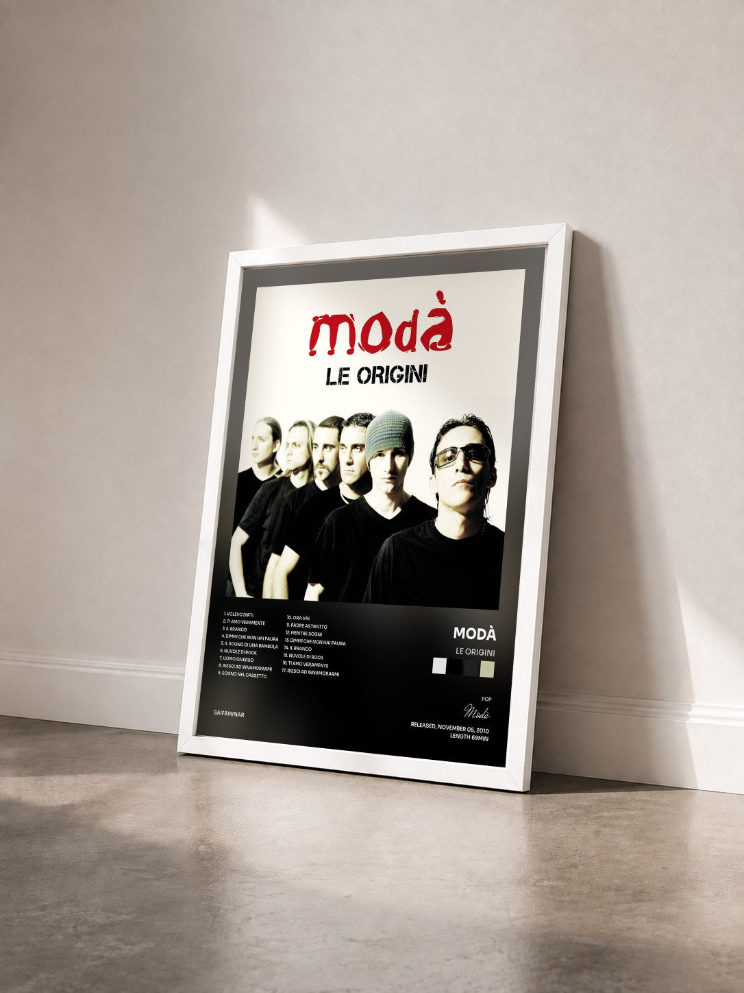 #blanc Tableau de l'album Le origini de Modà vu de trois quarts, cadre blanc