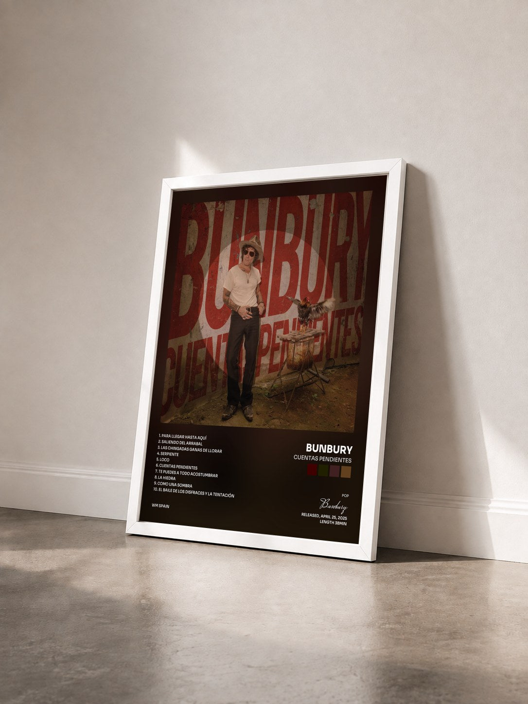#blanc Tableau de l'album Cuentas pendientes de Bunbury vu de trois quarts, cadre blanc