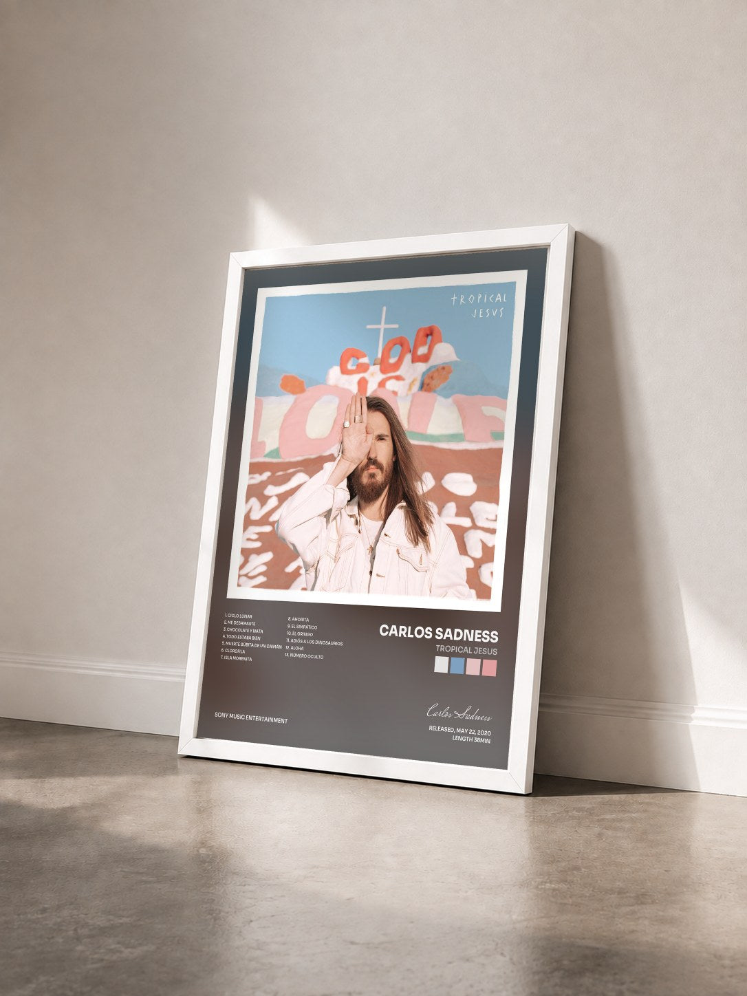 #blanc Tableau de l'album Tropical Jesus de Carlos Sadness vu de trois quarts, cadre blanc