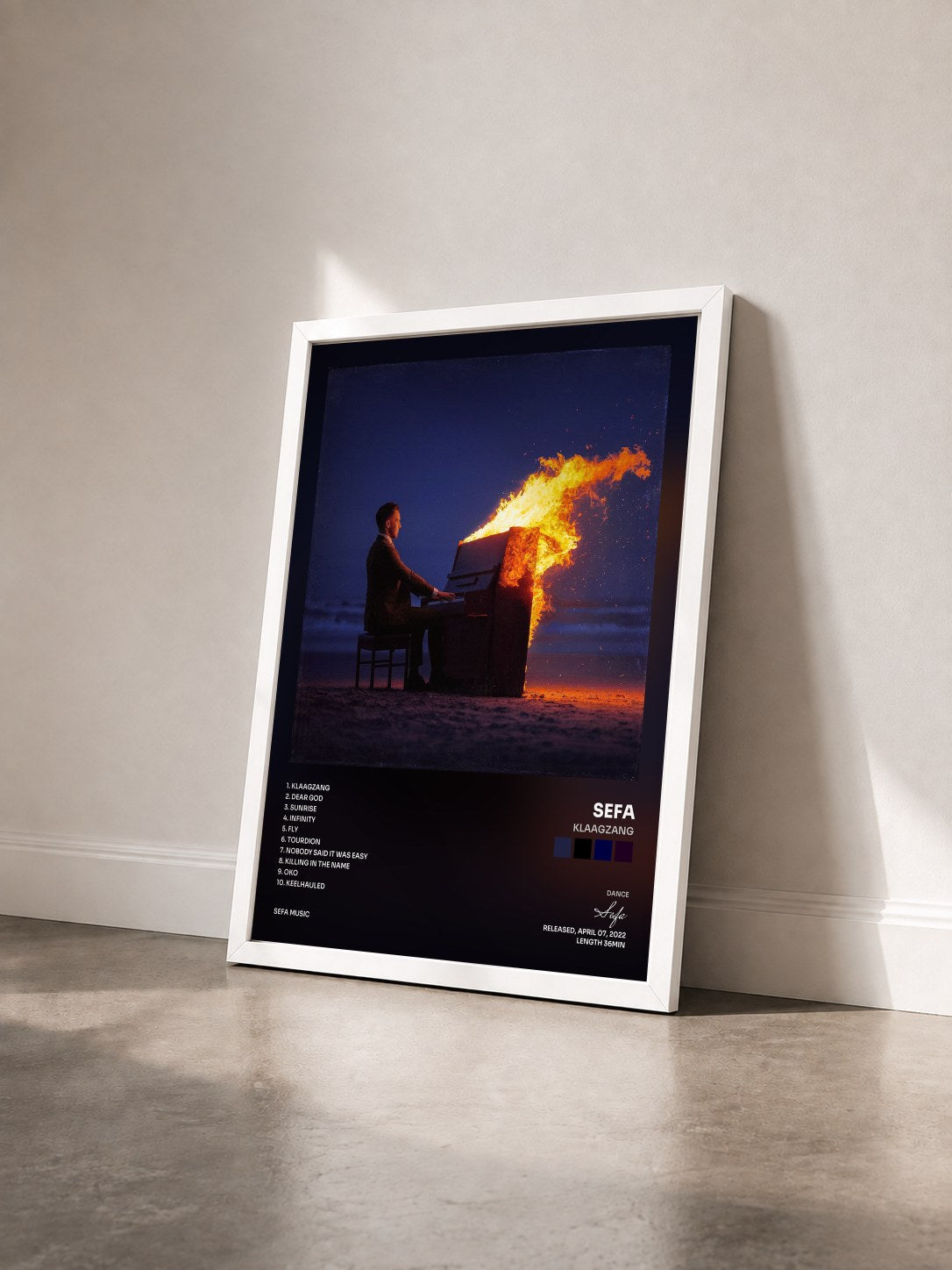#blanc Tableau de l'album Klaagzang de Sefa vu de trois quarts, cadre blanc