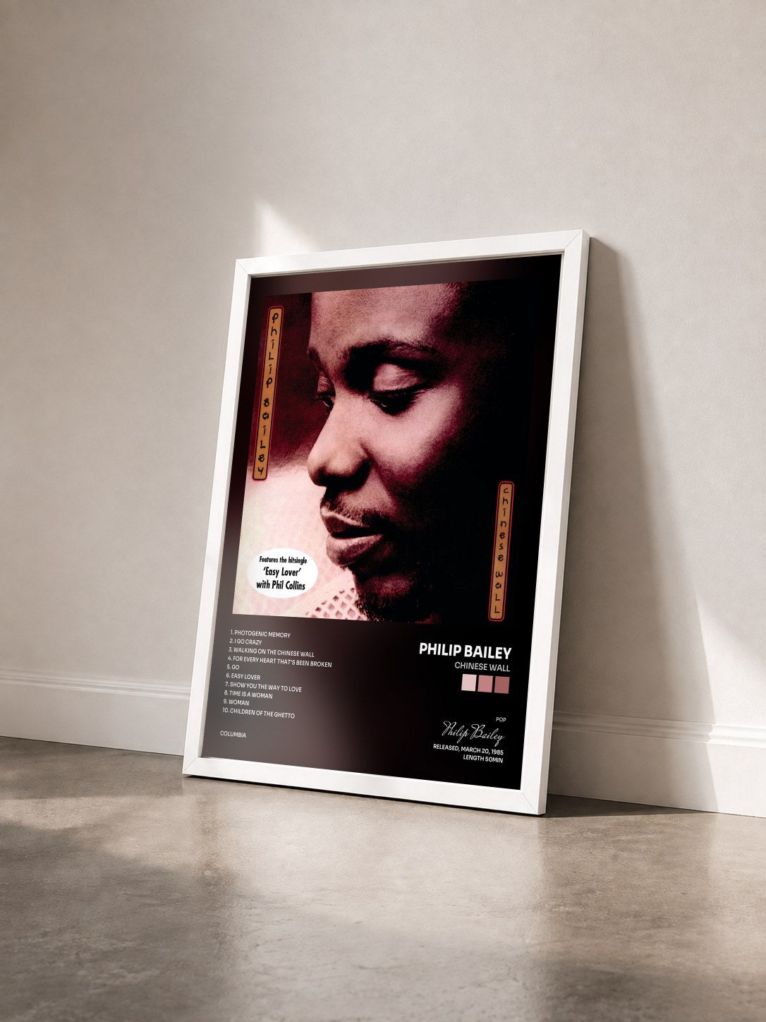 #blanc Tableau de l'album Chinese Wall de Philip Bailey vu de trois quarts, cadre blanc