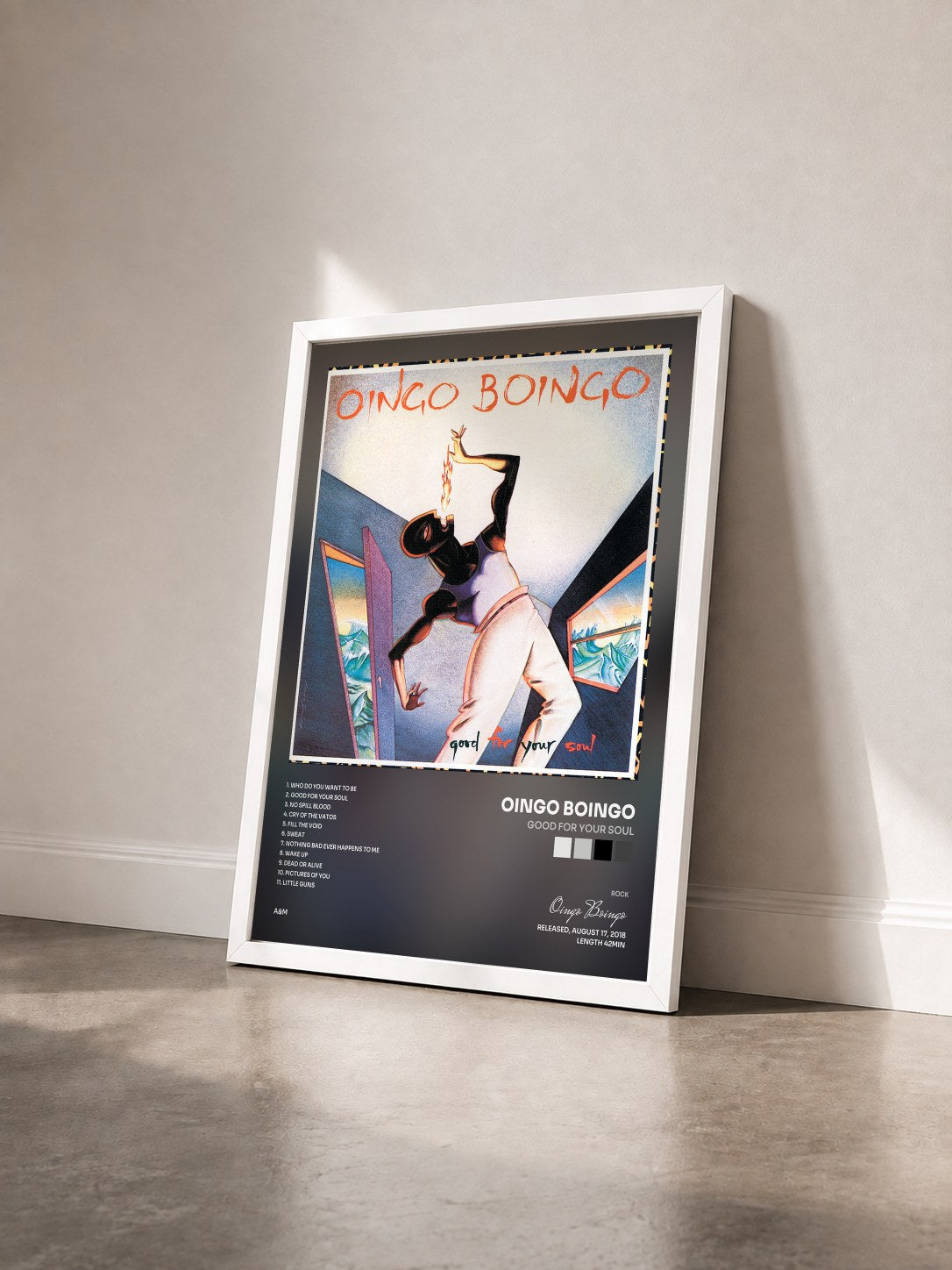 #blanc Tableau de l'album Good For Your Soul de Oingo Boingo vu de trois quarts, cadre blanc