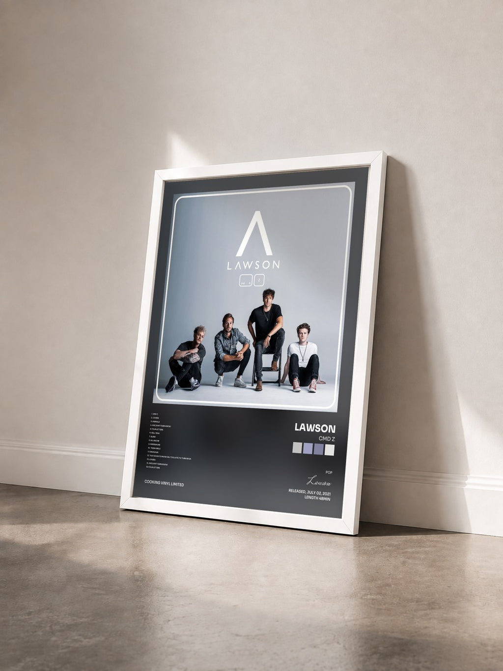 #blanc Tableau de l'album Cmd Z de Lawson vu de trois quarts, cadre blanc