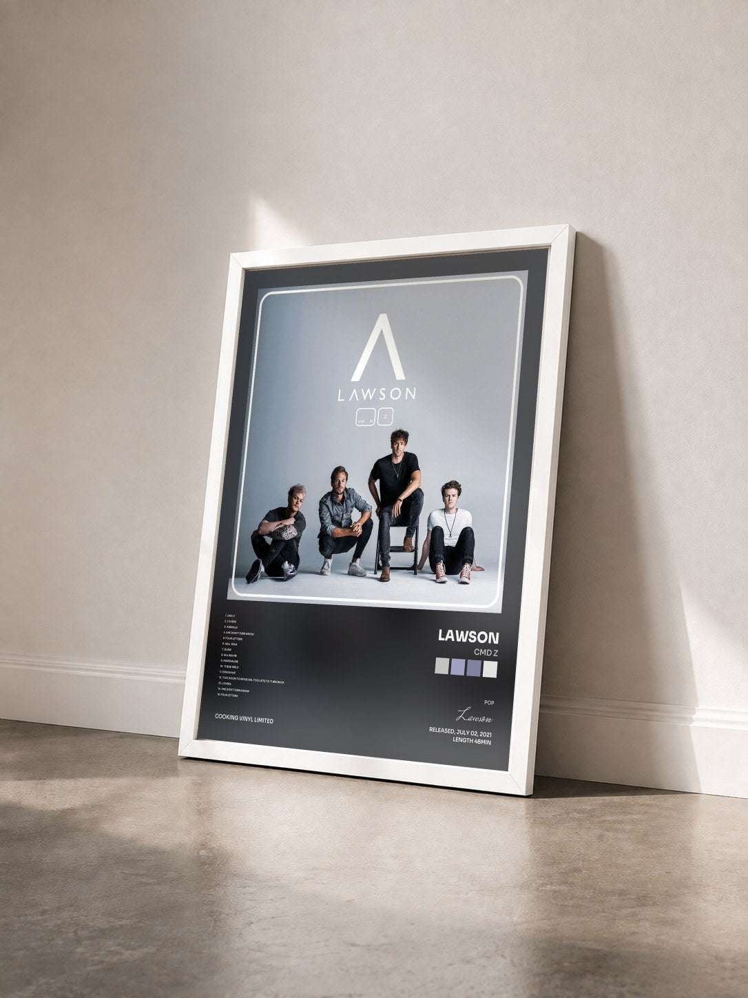 #blanc Tableau de l'album Cmd Z de Lawson vu de trois quarts, cadre blanc