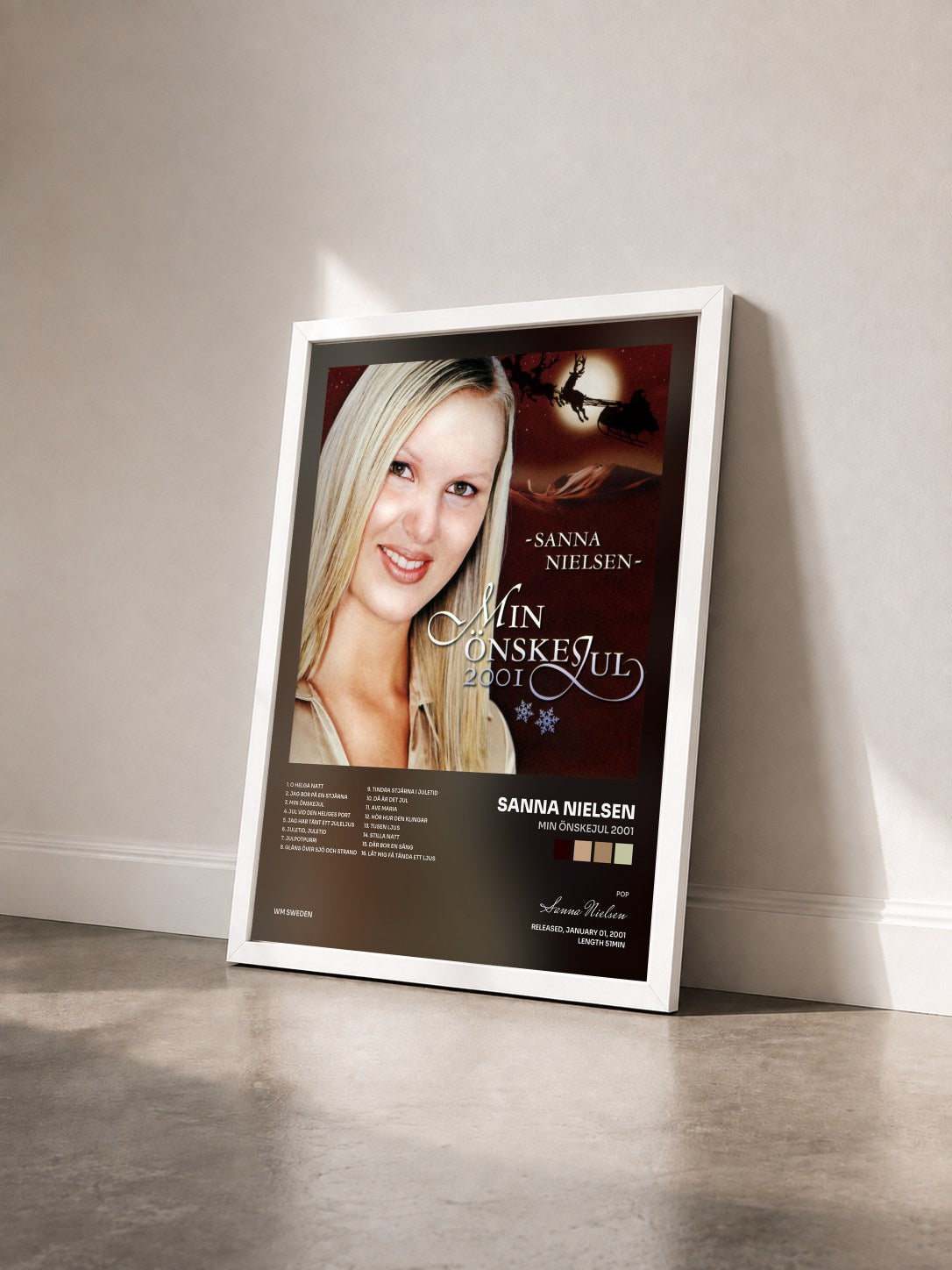 #blanc Tableau de l'album Min önskejul 2001 de Sanna Nielsen vu de trois quarts, cadre blanc