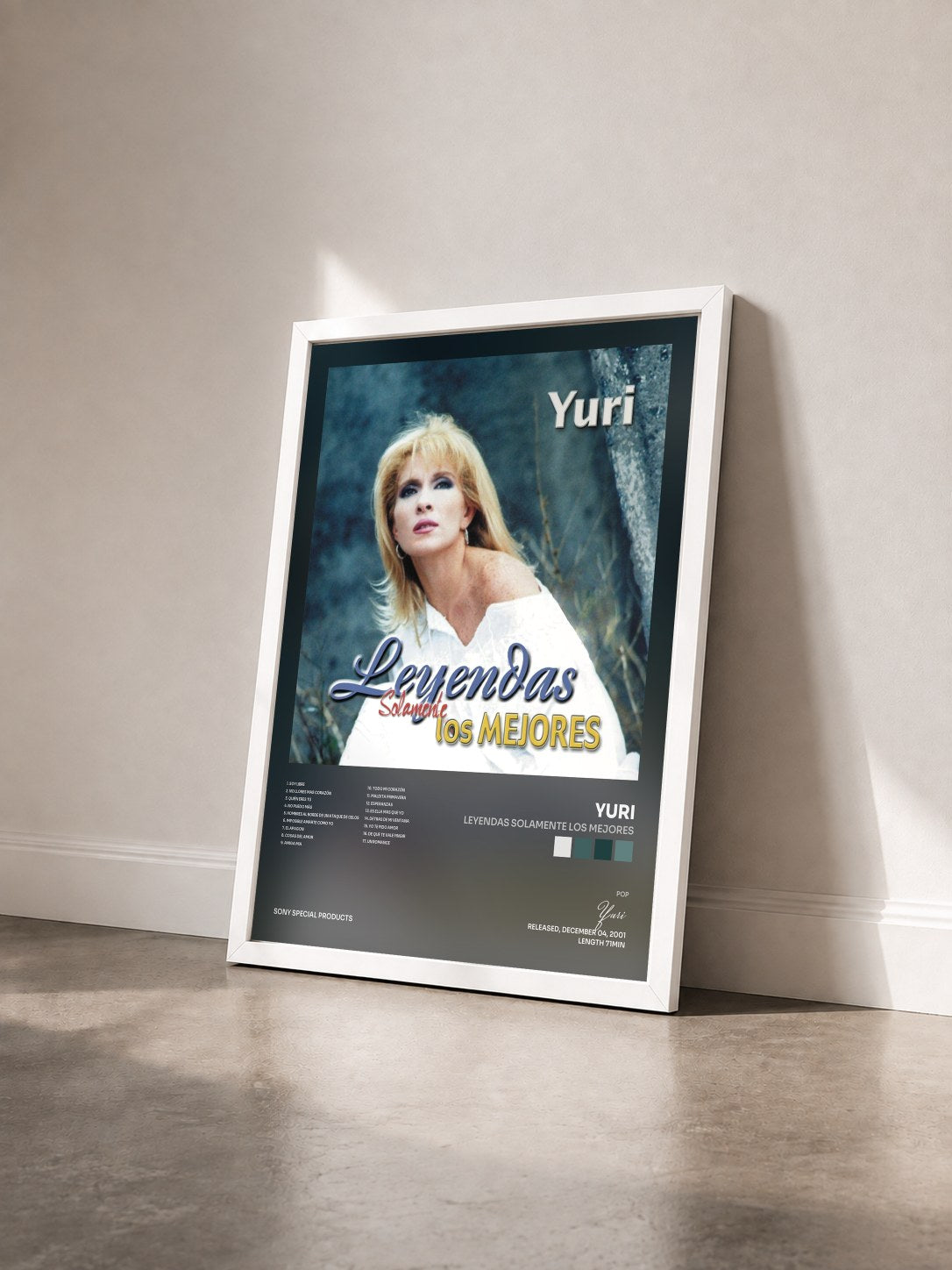 #blanc Tableau de l'album Leyendas Solamente Los Mejores de Yuri vu de trois quarts, cadre blanc
