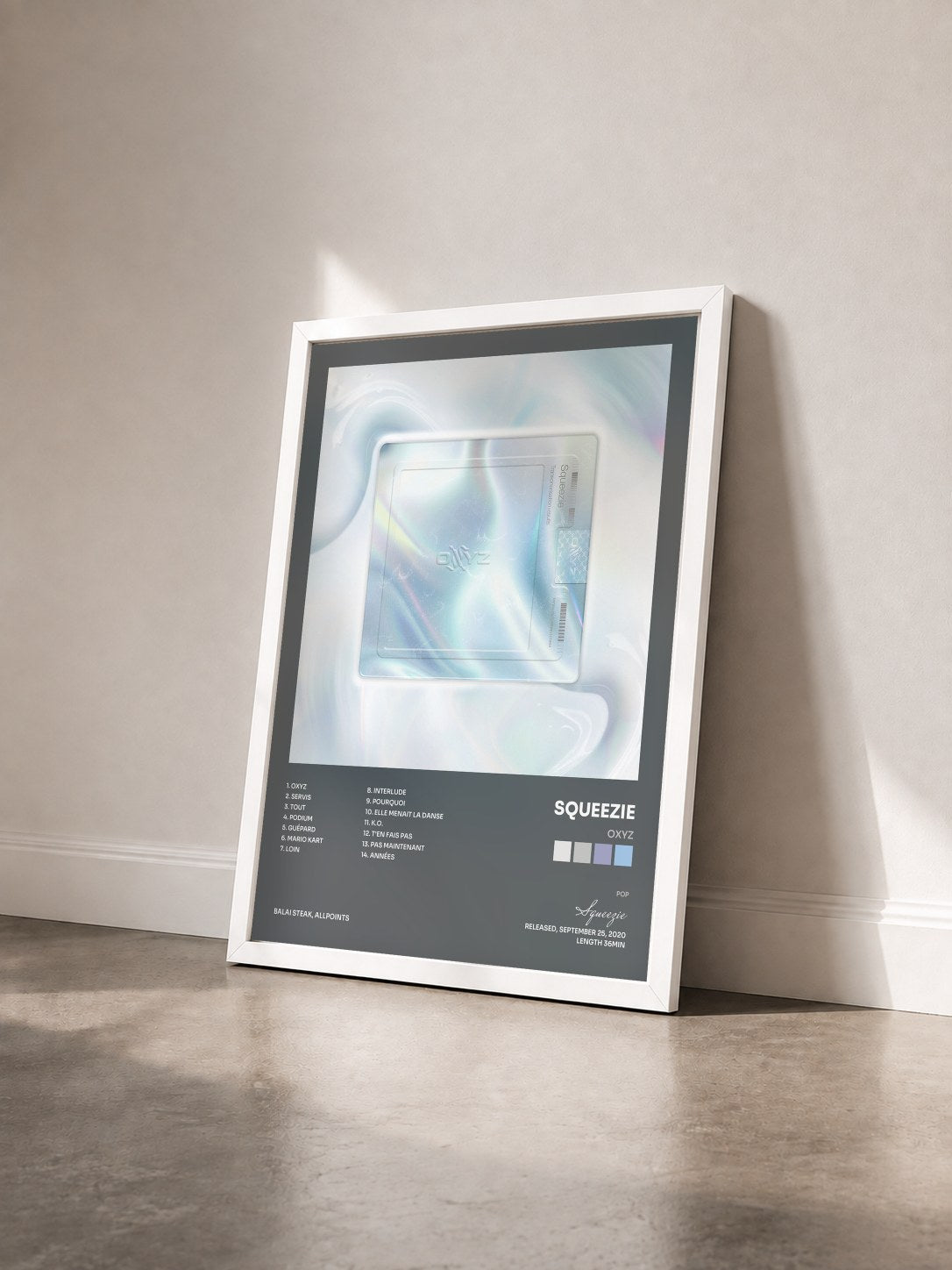 #blanc Tableau de l'album Oxyz de Squeezie vu de trois quarts, cadre blanc