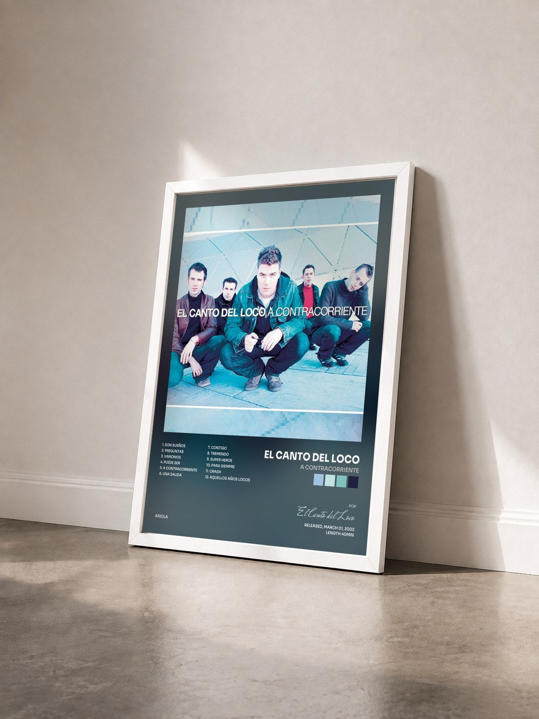 #blanc Tableau de l'album A Contracorriente de El Canto del Loco vu de trois quarts, cadre blanc