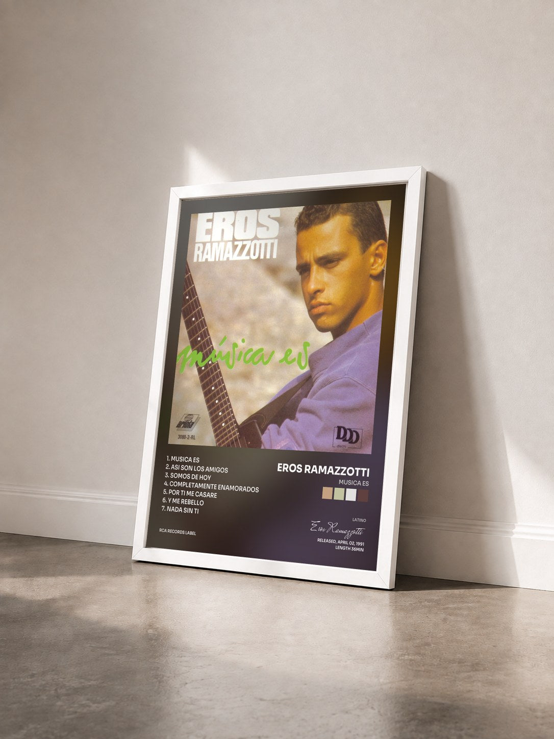 #blanc Tableau de l'album Musica Es de Eros Ramazzotti vu de trois quarts, cadre blanc
