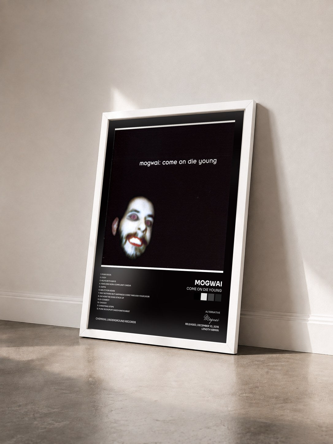 #blanc Tableau de l'album Come on Die Young de Mogwai vu de trois quarts, cadre blanc