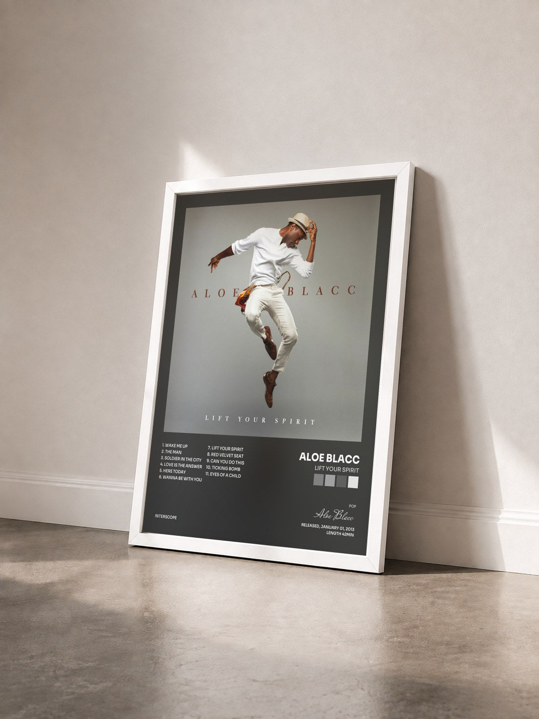 #blanc Tableau de l'album Lift Your Spirit de Aloe Blacc vu de trois quarts, cadre blanc