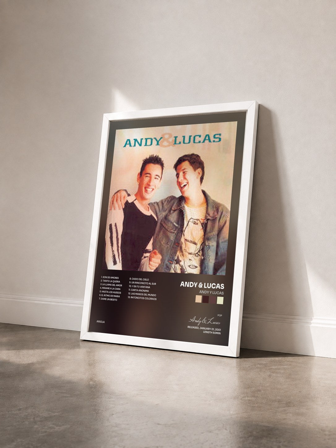 #blanc Tableau de l'album Andy Y Lucas de Andy & Lucas vu de trois quarts, cadre blanc