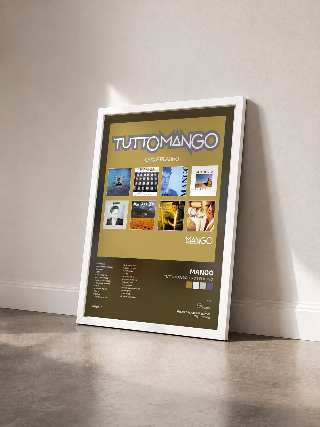 #blanc Tableau de l'album Tutto mango: Oro e Platino de Mango vu de trois quarts, cadre blanc