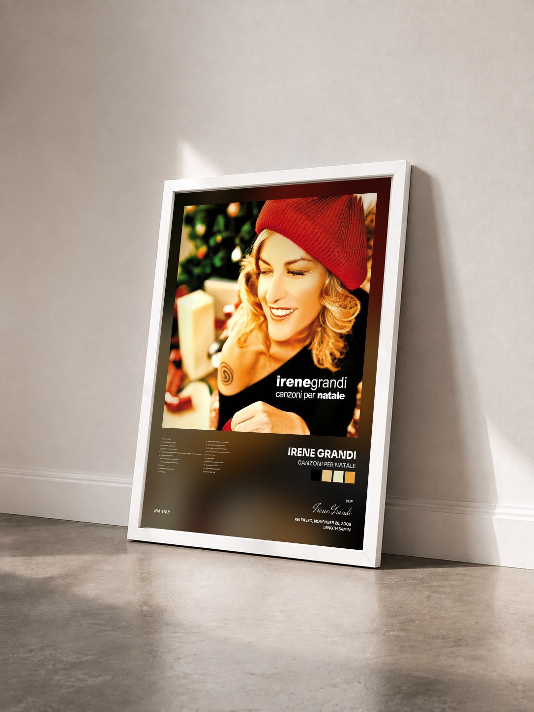 #blanc Tableau de l'album Canzoni per Natale de Irene Grandi vu de trois quarts, cadre blanc