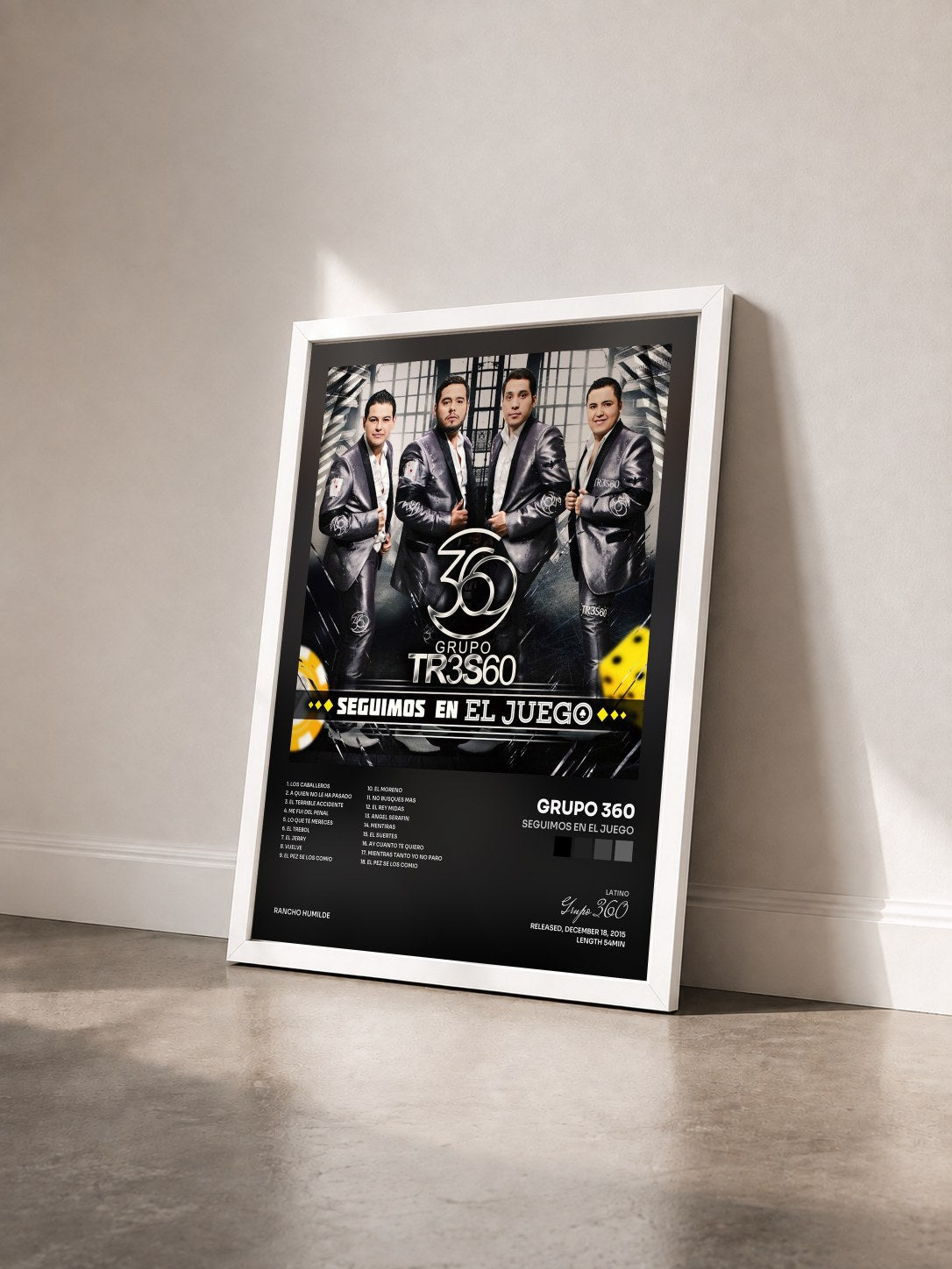 #blanc Tableau de l'album Seguimos En El Juego de Grupo 360 vu de trois quarts, cadre blanc