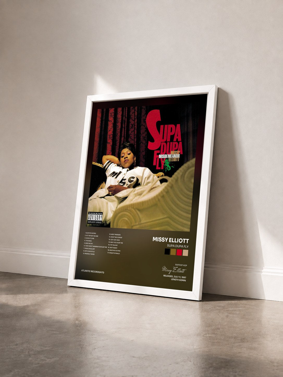 #blanc Tableau de l'album Supa Dupa Fly de Missy Elliott vu de trois quarts, cadre blanc