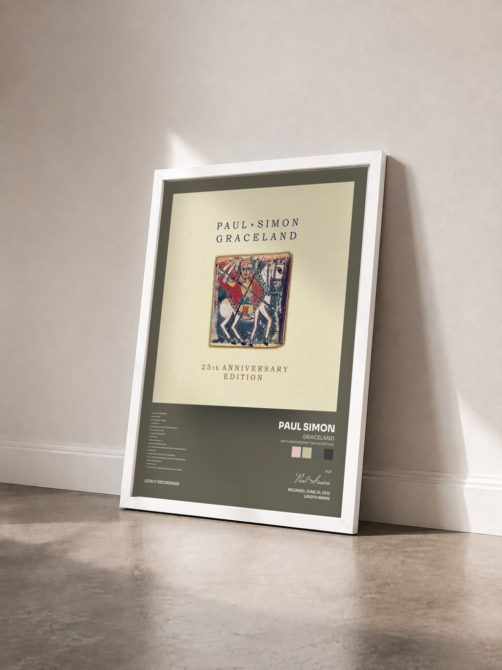 #blanc Tableau de l'album Graceland (25th Anniversary Deluxe Edition) de Paul Simon vu de trois quarts, cadre blanc