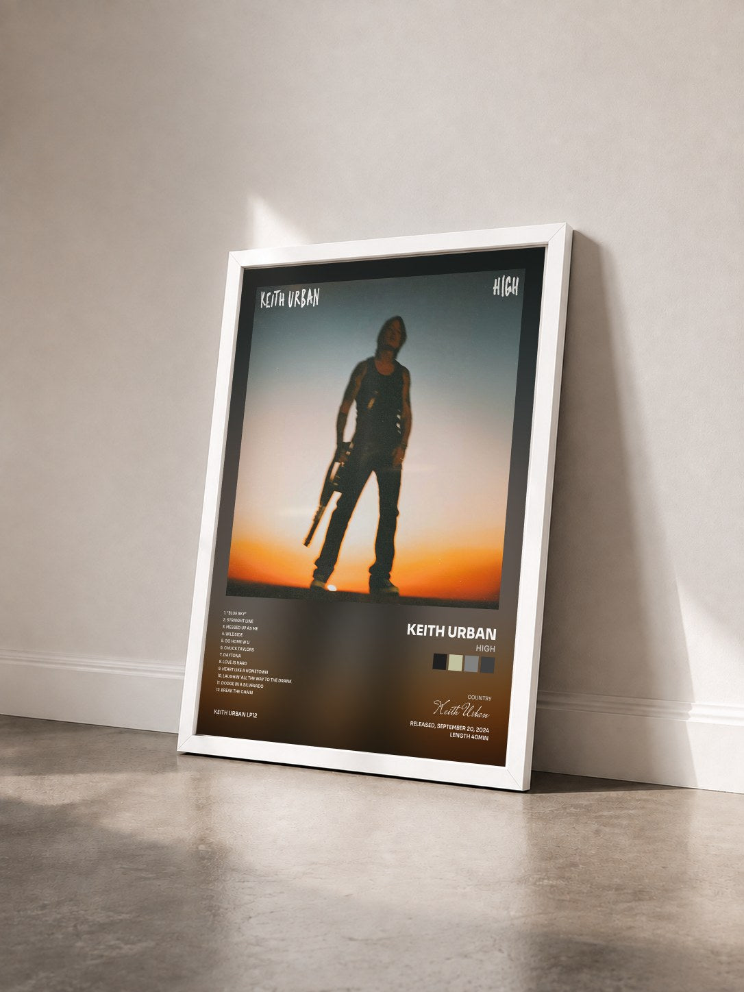 #blanc Tableau de l'album HIGH de Keith Urban vu de trois quarts, cadre blanc