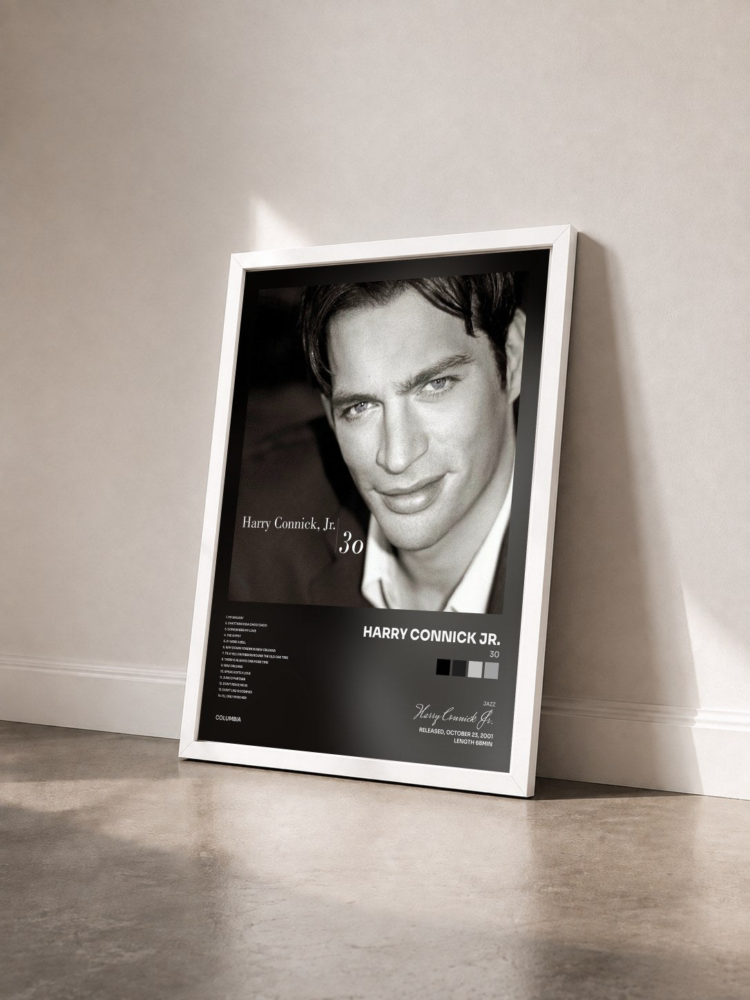 #blanc Tableau de l'album 30 de Harry Connick Jr. vu de trois quarts, cadre blanc