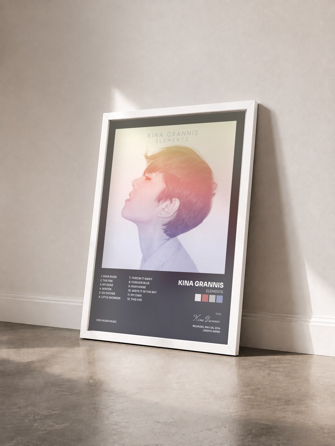 #blanc Tableau de l'album Elements de Kina Grannis vu de trois quarts, cadre blanc